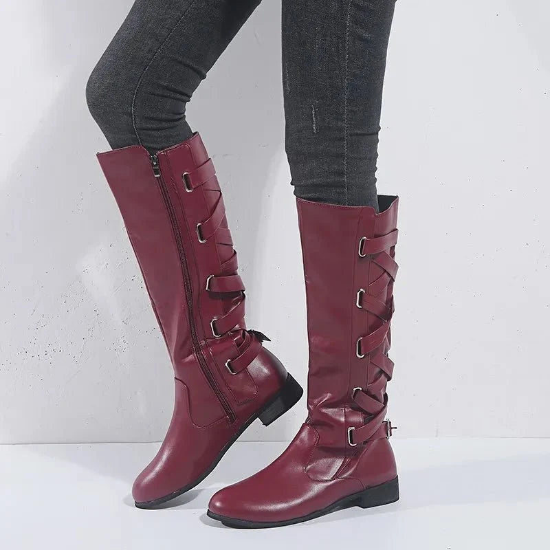 Women's Riding-Detail Adjustable Ankle Boots in burgundy.