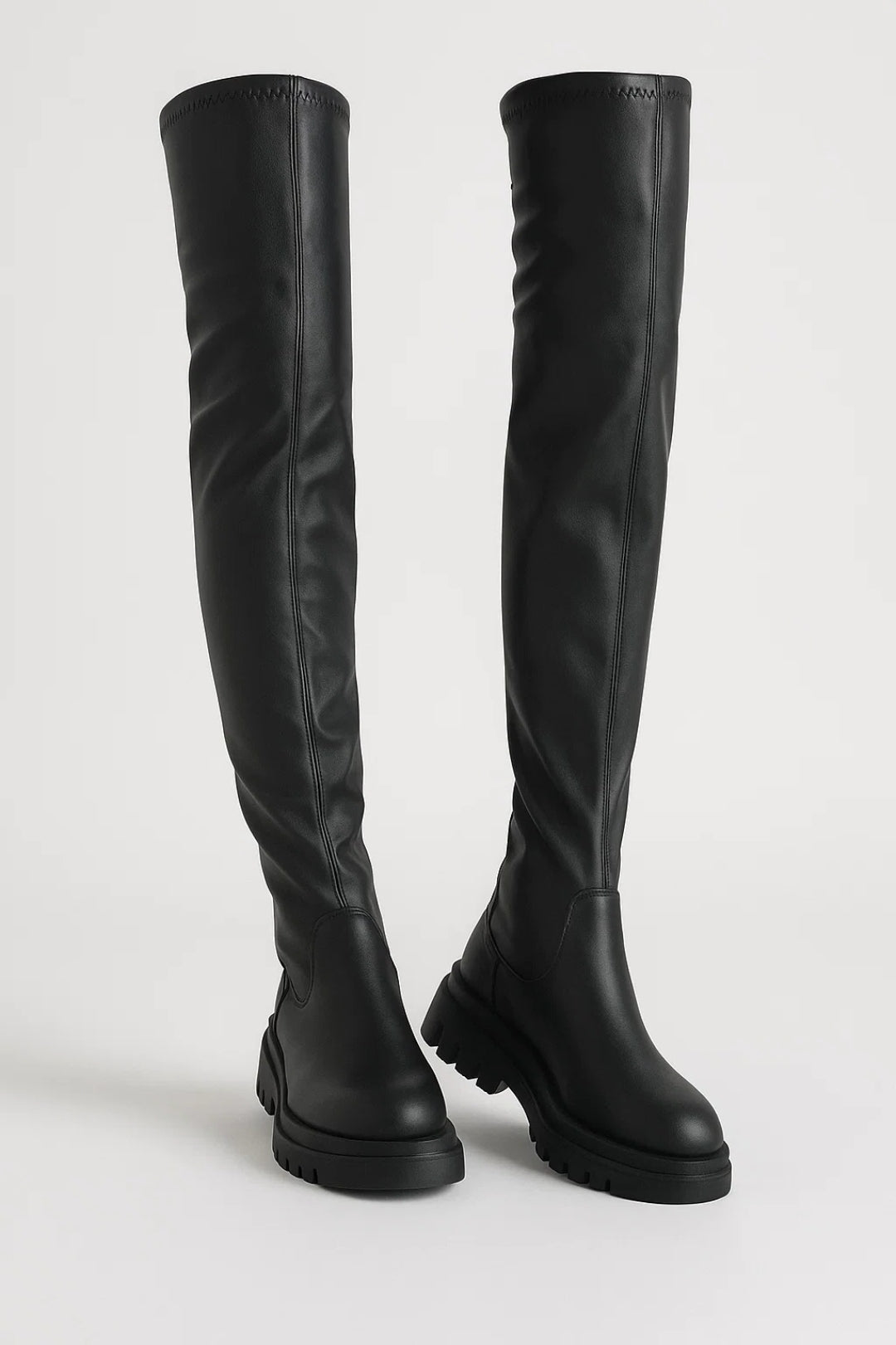 Women's Minimal Over-the-Knee Chunky Boots in black.